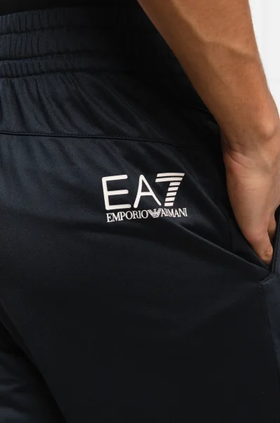 hlače trenirkaowe | regular fit EA7 	temno modra	